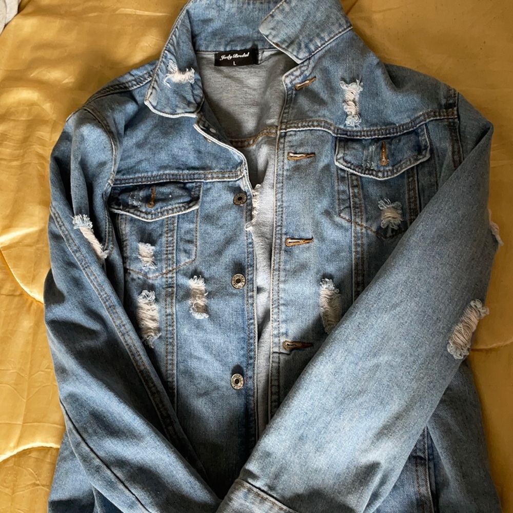 Distressed denim jacket
